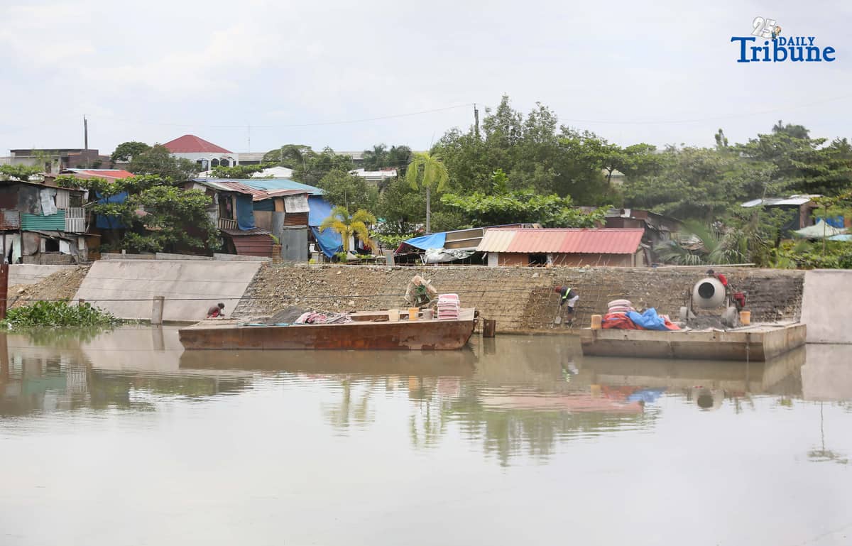(September 23 2025) Workers from the contractors of Department of Public Works and Highways (DPWH) Bulacan 1st District Engineering Office (DEO) were seen busy working the concrete laying on the riverbank protection structure along a river at Barangay Santa Cruz in Guiguinto, Bulacan on Friday September 19 2025. At the senate hearing held on Tuesday September 23 2025, former assistant district engineer Brice Hernandez said, From at least 2019 to 2025, or for the last six years, all Department of Public Works and Highways (DPWH) projects in the first district of Bulacan have been substandard, or at the very least “under-designed,” Photo/Analy Labor