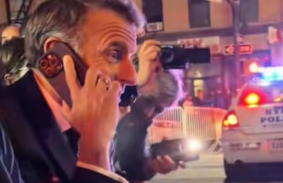 Stuck behind security lockdown, Macron hoofs it in NYC