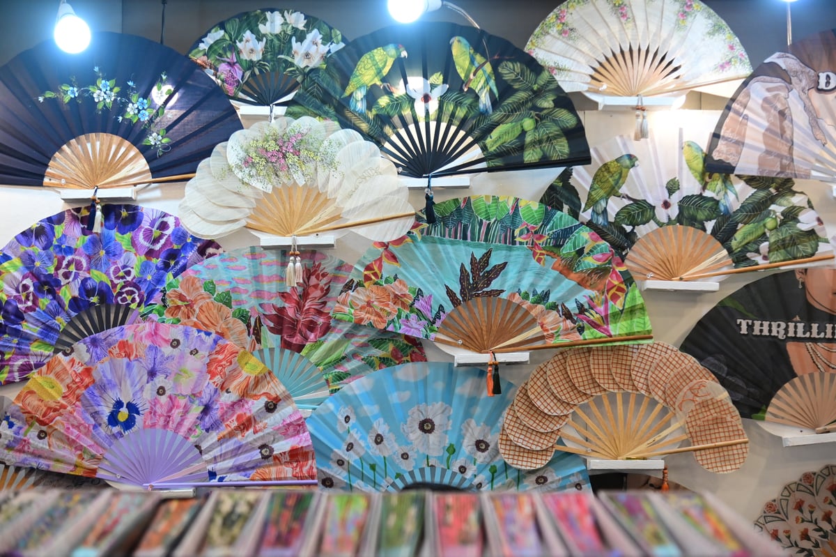 Colorful fans from the ‘City of Smiles’