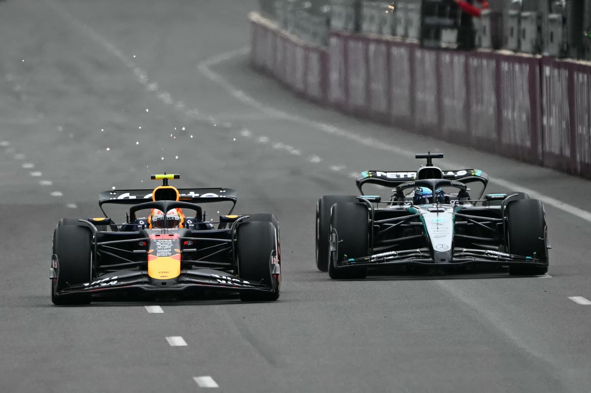 Red Bull Racing’s Japanese driver Yuki Tsunoda (left) and Mercedes’ British driver George Russell compete during the Formula One Azerbaijan Grand Prix.