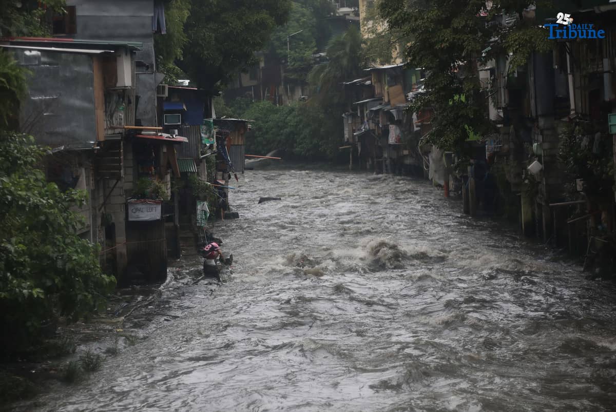(September 26 2025)  Strong current of water due to heavy rains brought by typhoon Opong is seen in Kamias Creek in Quezon City on Friday, September 26, 2025The Metro Manila Disaster Risk Reduction and Management Council urged the public to avoid non-essential travel until over the weekend due to severe weather conditions. Photo/Analy Labor