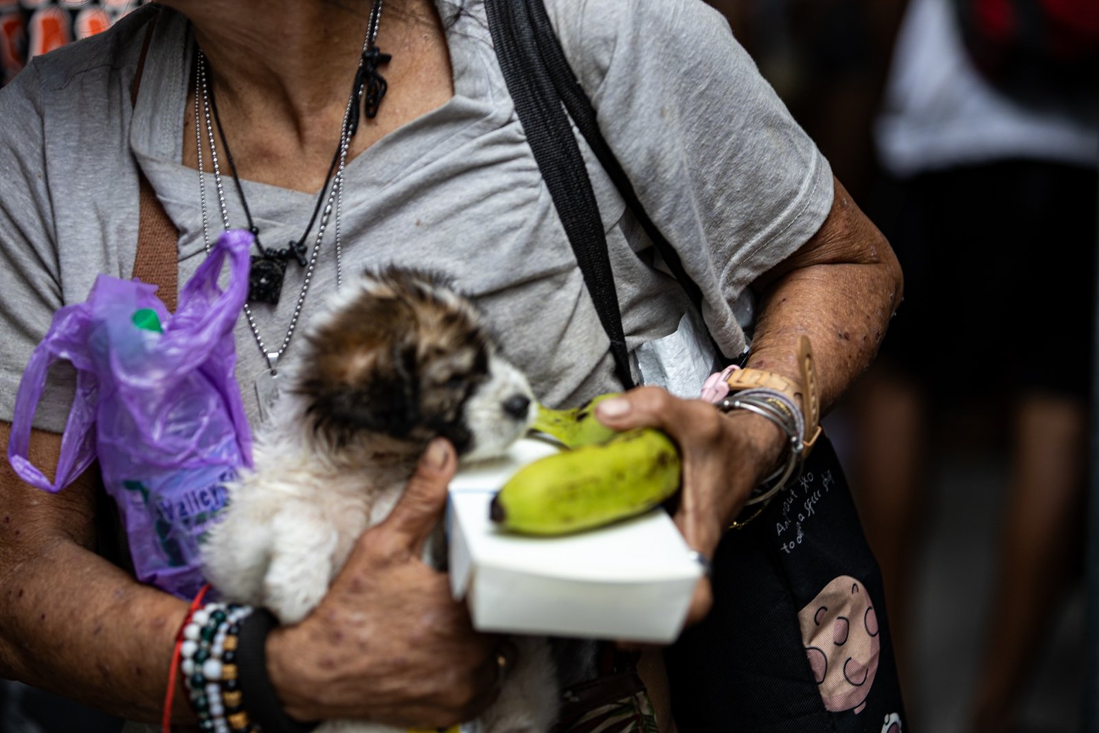 Individuals wait in line to receive food packs during a feeding program organized by a private group at San Vicente de Paul Parish in Manila on Saturday, 27 September 2025.

President Ferdinand Marcos Jr. ordered Friday the transfer of the Department of Public Works and Highways’ ₱36 billion flood control budget for 2026 to the Department of Social Welfare and Development to fund its programs, including the Assistance to Individuals in Crisis Situation (AICS), the Sustainable Livelihood Program, and the Pantawid Pamilyang Pilipino Program (4Ps).