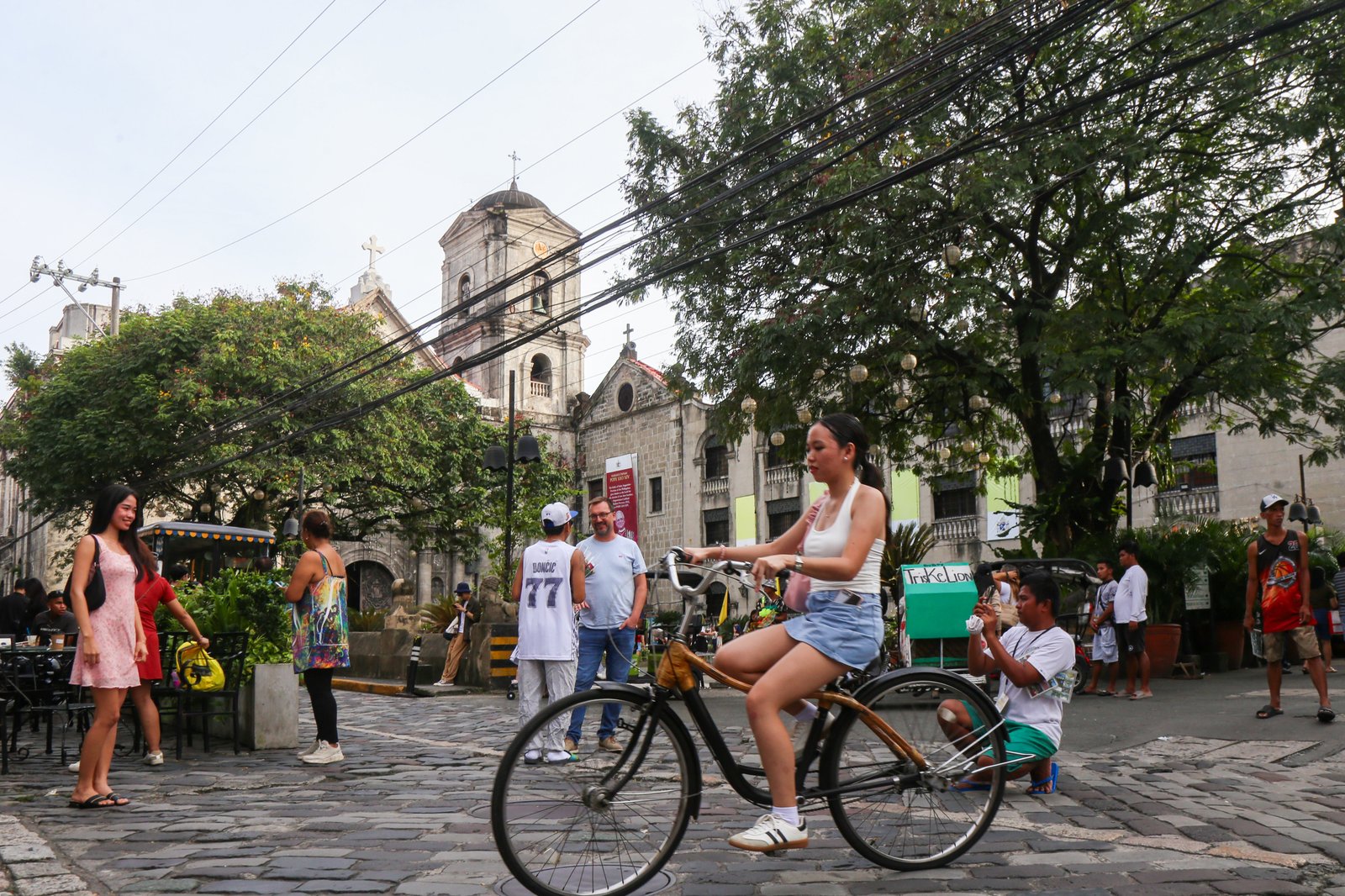 Tourists experience the sights and sounds of Intramuros in Manila on World Tourism Day, 27 September 2025. World Tourism Day highlights the industry's transformative potential as agent of positive change such as social progress, delivering education, employment and creating opportunities for all.