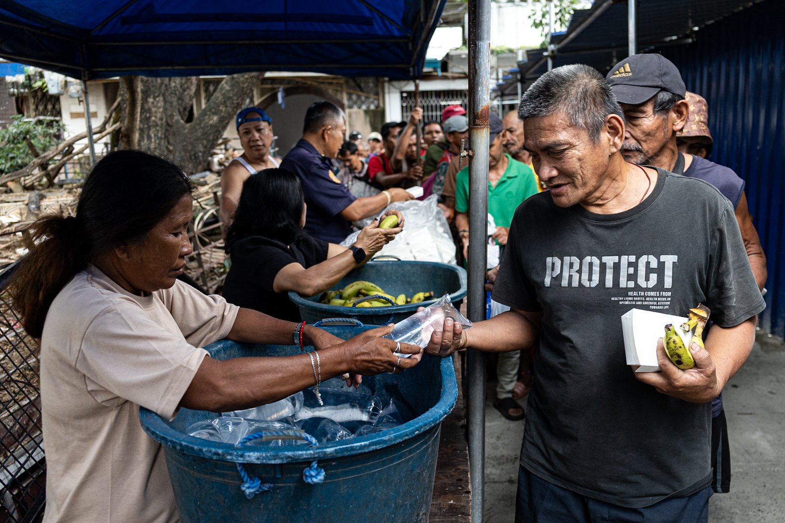Individuals wait in line to receive food packs during a feeding program organized by a private group at San Vicente de Paul Parish in Manila on Saturday, 27 September 2025.

President Ferdinand Marcos Jr. ordered Friday the transfer of the Department of Public Works and Highways’ ₱36 billion flood control budget for 2026 to the Department of Social Welfare and Development to fund its programs, including the Assistance to Individuals in Crisis Situation (AICS), the Sustainable Livelihood Program, and the Pantawid Pamilyang Pilipino Program (4Ps).
