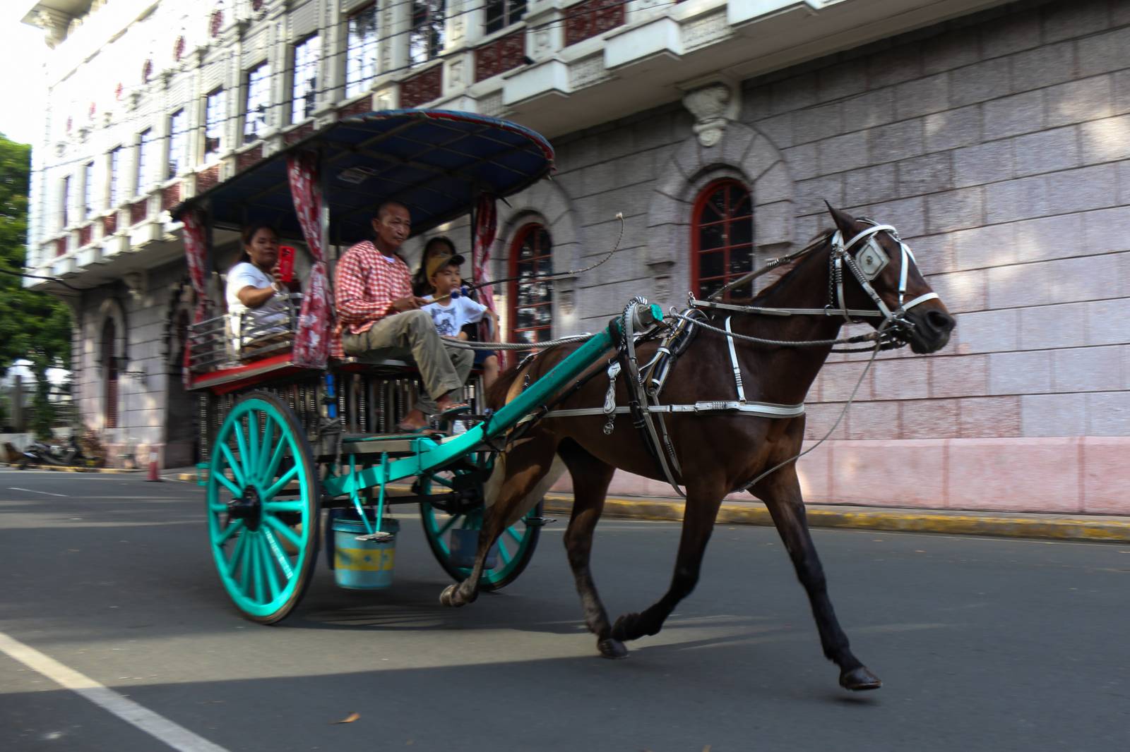 Tourists experience the sights and sounds of Intramuros in Manila on World Tourism Day, 27 September 2025. World Tourism Day highlights the industry's transformative potential as agent of positive change such as social progress, delivering education, employment and creating opportunities for all.