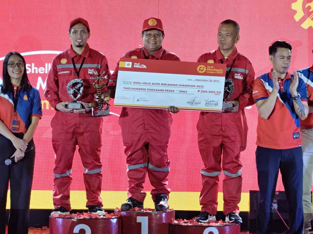 WINNERS of the first Shell Helix Auto Mekaniko Champions stand on the podium, led by champion Mark Anthony Calimag.