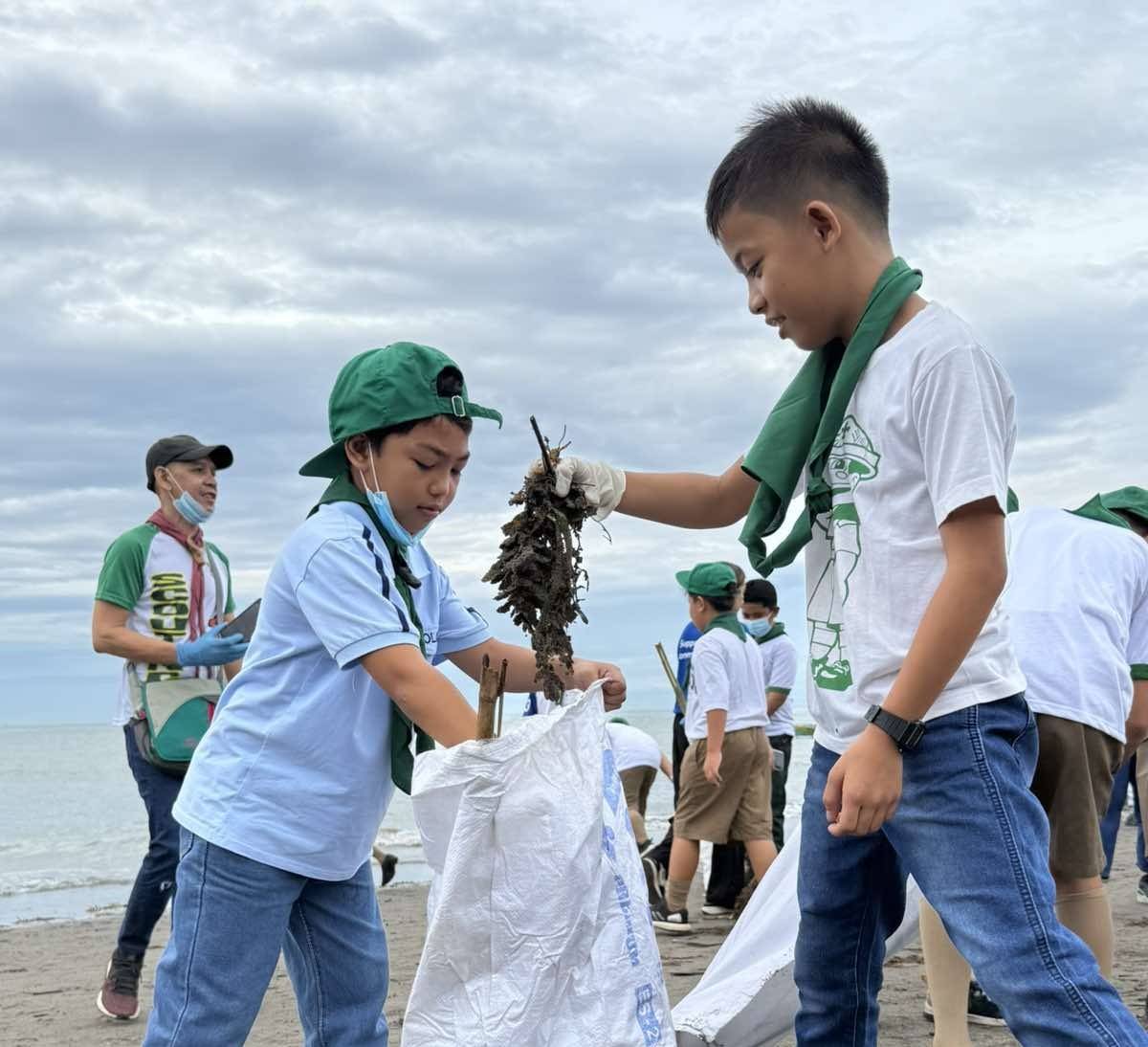 At SM City Lucena Young participants make a powerful gesture for global change.