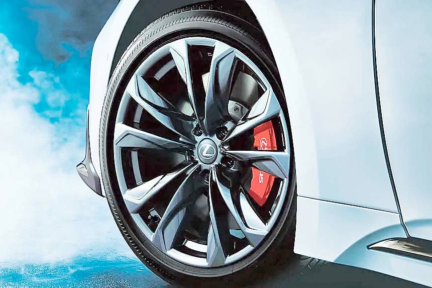THE LS F Sport now highlights its performance with red brake calipers accented by a silver Lexus logo.