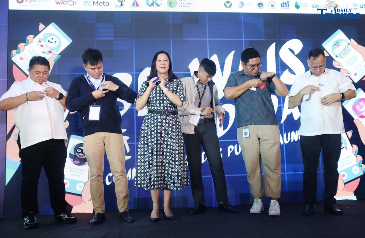 Quezon City Mayor Joy Belmonte speaks during the launch of the “BE WAIS” Community Guides, a joint initiative with Meta, Bayan Academy, and the Ateneo Office for Social Concern and Involvement (Ateneo-OSCI), at the Amoranto Sports Complex in Quezon City. The BE WAIS Guides are designed to help communities combat online fraud, scams, misinformation, and disinformation.