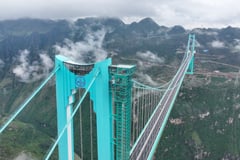 World's highest bridge opens to traffic in China