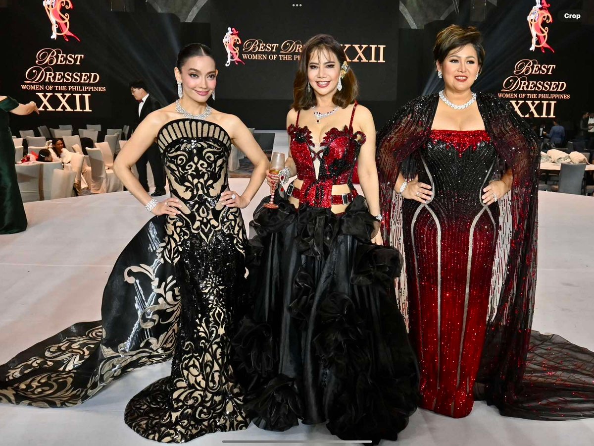 Pia Yanson, your columnist and Maybelle Padillo. Both wearing Michael Cinco gown.