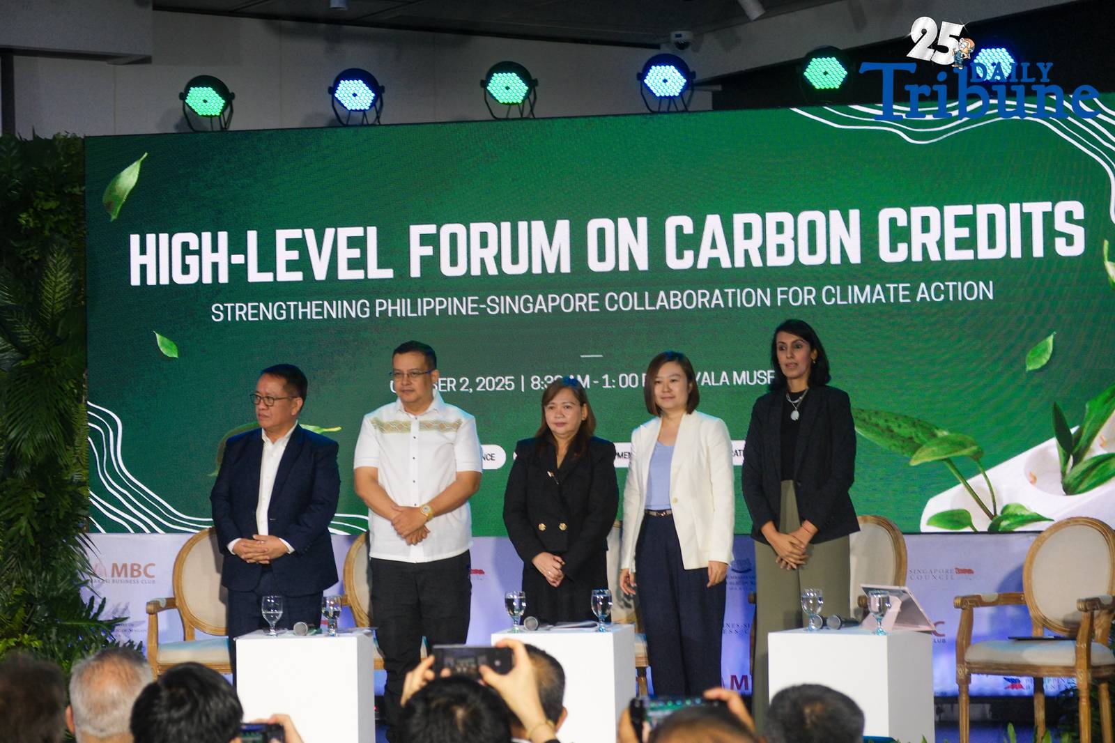 Augusto Zobel de Ayala, Vice Chairman of the Makati Business Club (MBC) and Chairman of the Philippines–Singapore Business Council, welcomed participants to the High-Level Forum on Carbon Credits on October 2, 2025, at the Ayala Museum in Makati City.
 


The forum, hosted by the MBC, brought together policymakers, industry leaders, and experts to examine the current state of carbon markets and the growing Philippines–Singapore partnership under Article 6 of the Paris Agreement.


A key backdrop to the discussion was the August 2024 Memorandum of Understanding (MOU) on carbon credits cooperation, witnessed by Singapore President Tharman Shanmugaratnam and Philippine President Ferdinand R. Marcos Jr.
This MOU marked both countries’ commitment to developing a credible, high-integrity carbon market in the region.
Following the MOU, the Philippines and Singapore began negotiating an Implementation Agreement to enable the generation and transfer of carbon credits from mitigation projects in the Philippines.


Panel Discussion 1: Building the Philippine Carbon Market and the Role of the Philippines–Singapore Implementation Agreement featured Congressman Jose Manuel Alba, DENR Undersecretary Analiza Rebuelta-Teh, DOE Undersecretary Felix William Fuentebella, Singapore MTI Director Fam Wee Wei, and ADB Senior Market Development Advisory Specialist Ruchika Saluja.
This panel explored the legislative, regulatory, and regional frameworks needed to strengthen the Philippine carbon market while aligning with international standards.


Panel Discussion 2: Navigating the Philippine Landscape of the Carbon Market highlighted private sector and NGO perspectives.
Speakers included MBC Trustee Lito Tayag, ACEN President and CEO Eric Francia, Arkadiah CEO Reuben Lai, GenZero Investment Director Antoinette Li, and WWF Global Lead for Carbon Finance and Markets Taskforce Rueban Manokara.
This session emphasized the role of businesses, investors, and civil society in shaping market integrity, financing low-carbon transitions, and creating sustainable opportunities.


PHOTOS BY YUMMIE DINGDING