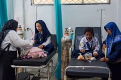 Free meals program under fire after thousands sickened
