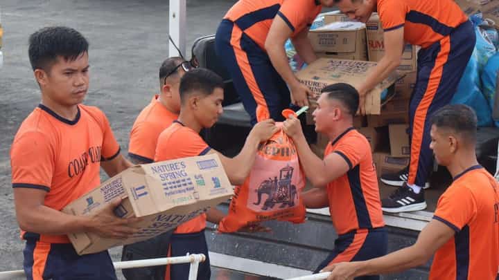 Relief goods from multiple government sectors are loaded onto BRP Corregidor (AE-891) with help from PCG-Western Visayas personnel.