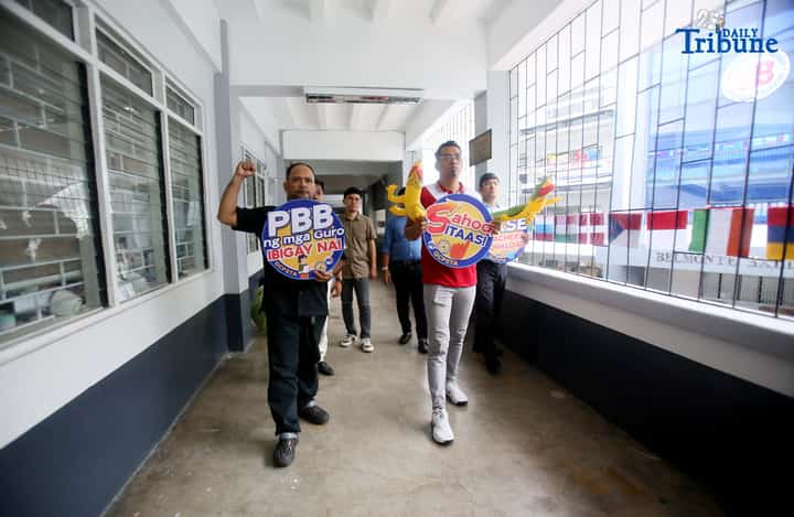 (October 03 2025) Teachers at the Justice Cecilia Munoz Palma High School,in Quezon City on Friday October 3 2025, hold a placard during their walk out protest to demand substantial salary increase, a doubled education budget, and accountability for systemic corruption that deprives schools of resources, on World Teachers’ Day, to protest against government neglect, corruption, and bureaucrat capitalism. Photo/Analy Labor