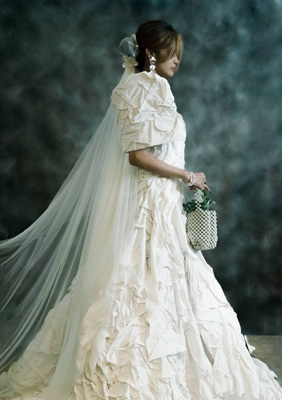 THE bridal concept features the iconic butterfly sleeves elevated into a structured 'kumo-ot' design distinct.
