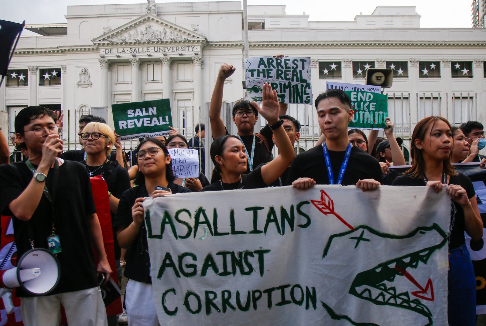 Lasallians gather at the sidewalk of Taft Avenue, Monday afternoon, 06 October 2025, for a protest calling for accountability and justice amid corruption issues hounding the government.