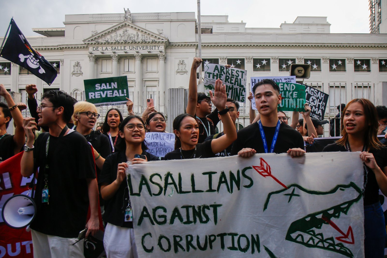 Lasallians gather at the sidewalk of Taft Avenue, Monday afternoon, 06 October 2025, for a protest calling for accountability and justice amid corruption issues hounding the government.