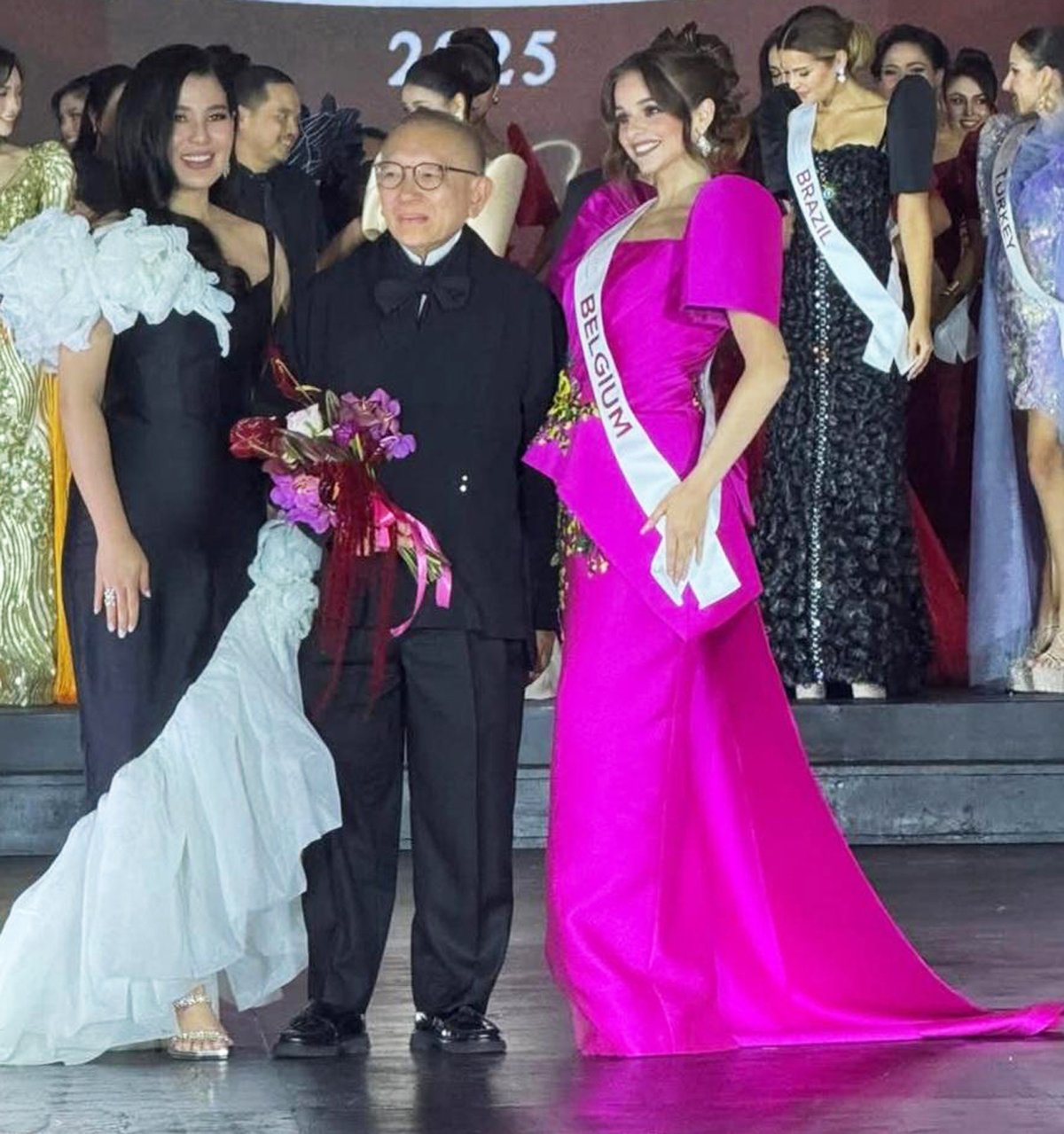 Philip Rodriguez with Eva Patalinghug Lim and Ms.Belgium, Jana Janssens, Best in Terno.