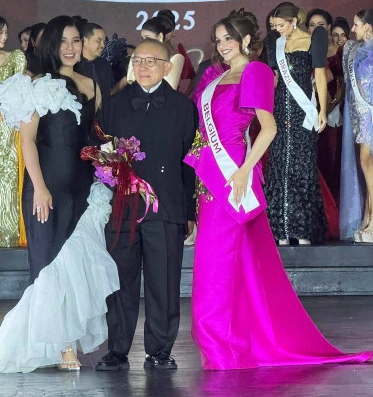 Philip Rodriguez with Eva Patalinghug Lim and Ms.Belgium, Jana Janssens, Best in Terno.