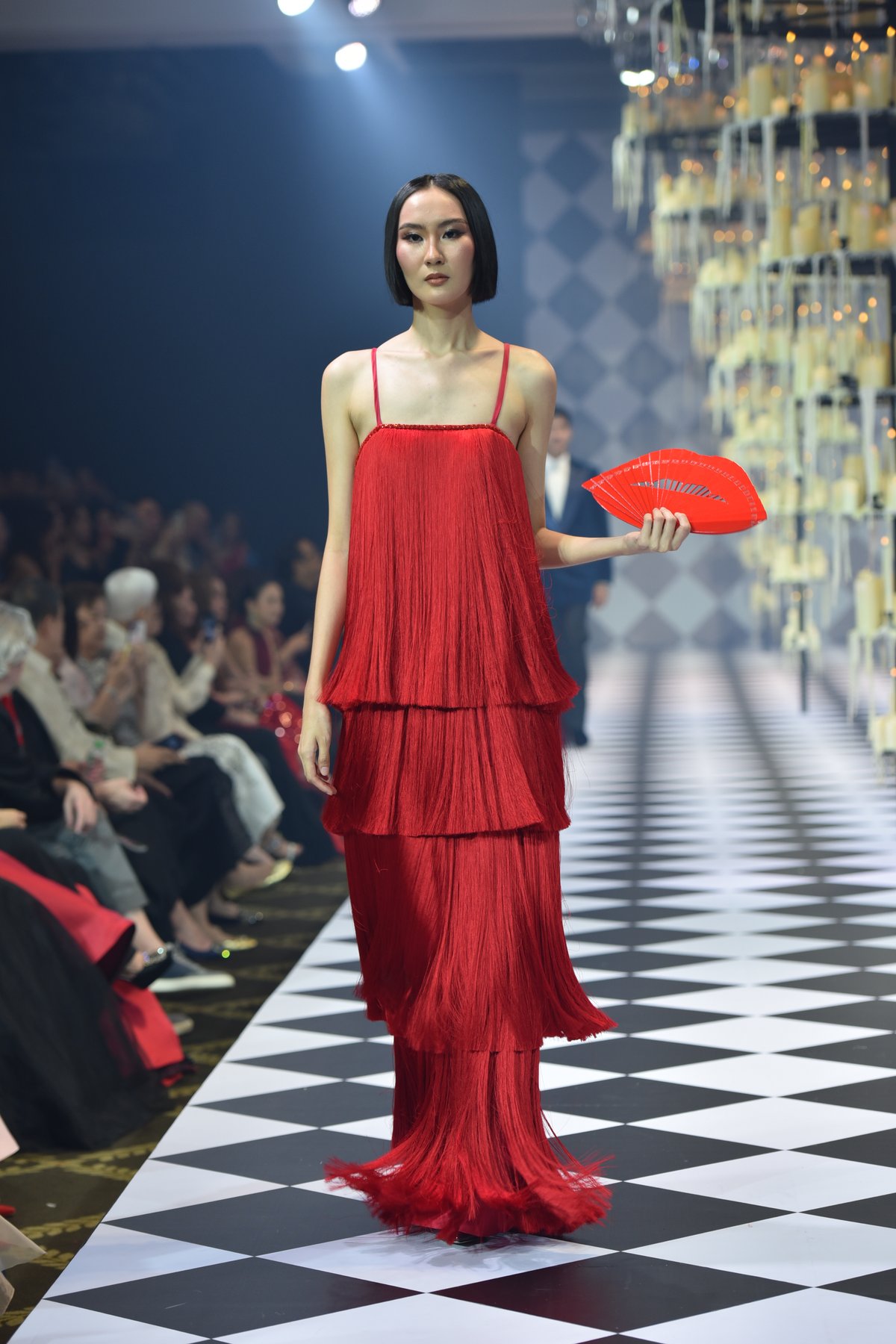 Strapless Swiss lace column gown with silk organdy panels.