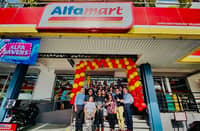 STORE opening in Chrysanthemum Village in San Pedro, Laguna with Alfamart COO Harvey Ong and Engr. Leovino Datario, the first franchisee of Alfamart, and wife Doris Datario