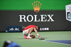 Exhausted Djokovic makes Shanghai QF