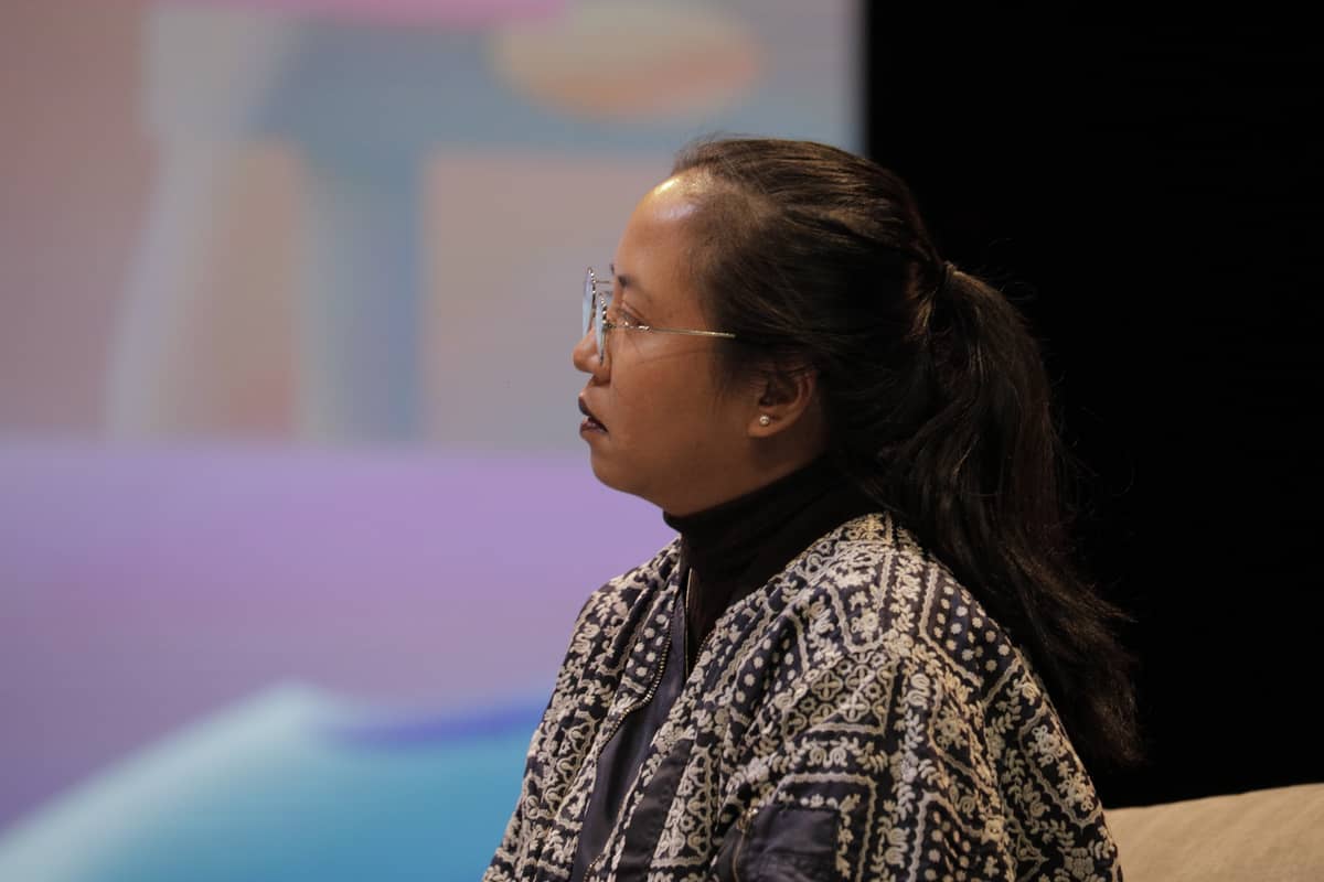 Rose Costuna serves as the moderator for the panel talk 'Empowered by Purpose.'