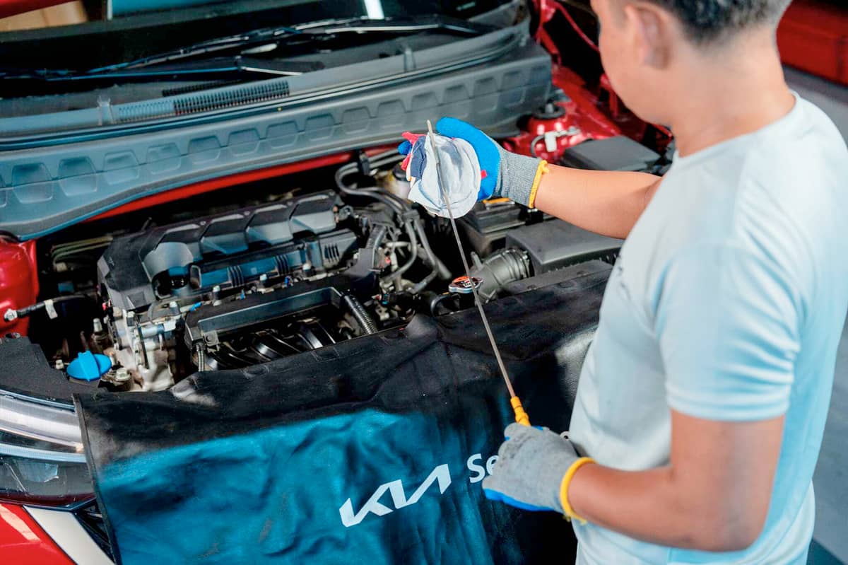 ROUTINE oil checks are part of Kia’s preventive maintenance service, keeping engines in top condition.