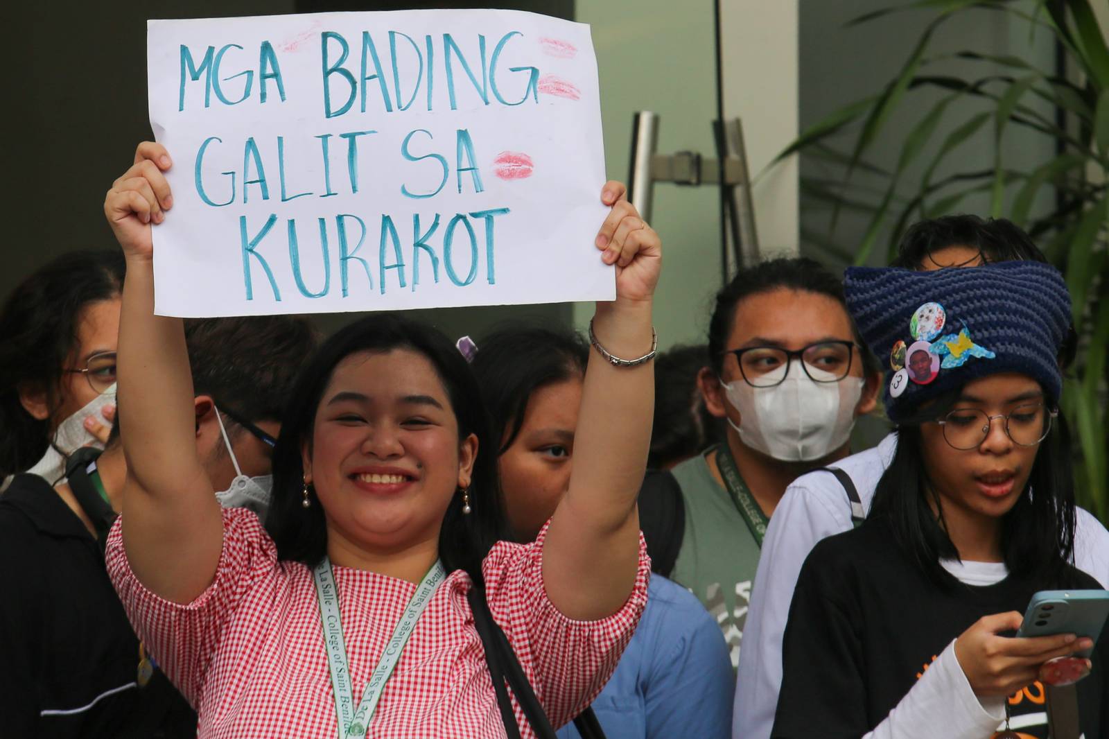 Students from the College of Saint Benilde (CSB) gather at the School for Design and Arts Campus (D+A Campus) along P. Ocampo Street on the afternoon of 13 October 2025 to protest against the worsening government corruption.