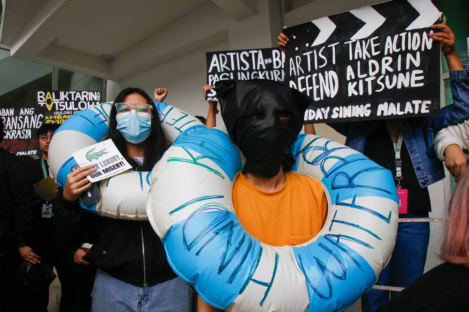 Students from the College of Saint Benilde (CSB) gather at the School for Design and Arts Campus (D+A Campus) along P. Ocampo Street on the afternoon of 13 October 2025 to protest against the worsening government corruption.