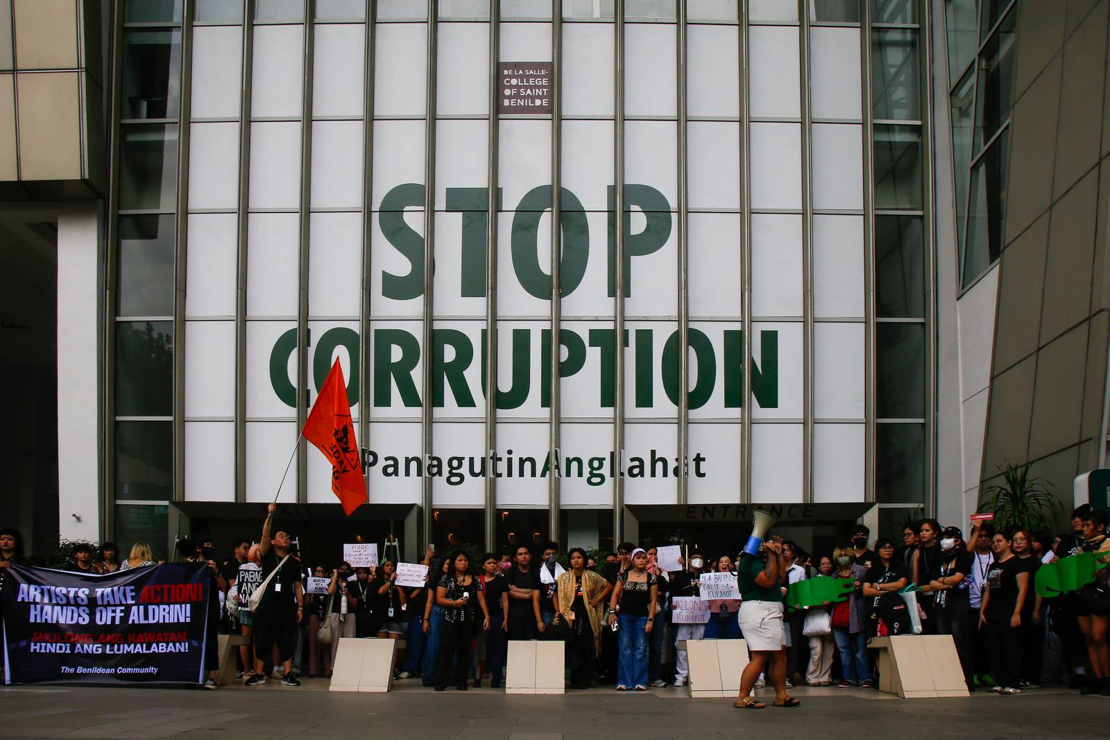 Students from the College of Saint Benilde (CSB) gather at the School for Design and Arts Campus (D+A Campus) along P. Ocampo Street on the afternoon of 13 October 2025 to protest against the worsening government corruption.
