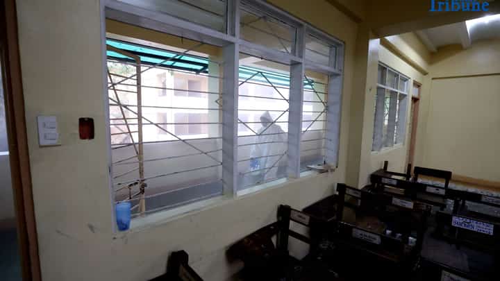 On 14 October 2025, volunteer Parent Teacher Association (PTA) and faculty members wearing personal protective equipment disinfected classrooms and common areas using a water-based solution at Quezon City High School.