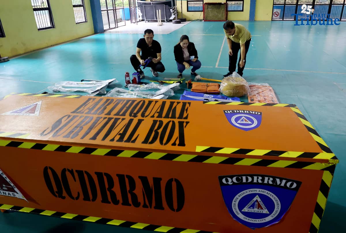 (October 14 2025) Disaster Risk Reduction and Management Council Coordinator Freddie Cayabyab conduct an inspection of “Earthquake Survival Box” issued to the Quezon City High School by the QC-DRRMO including the necessary tools essential for rescue operations during earthquakes or fire on on Tuesday, October 14, 2025. Photo/Analy Labor