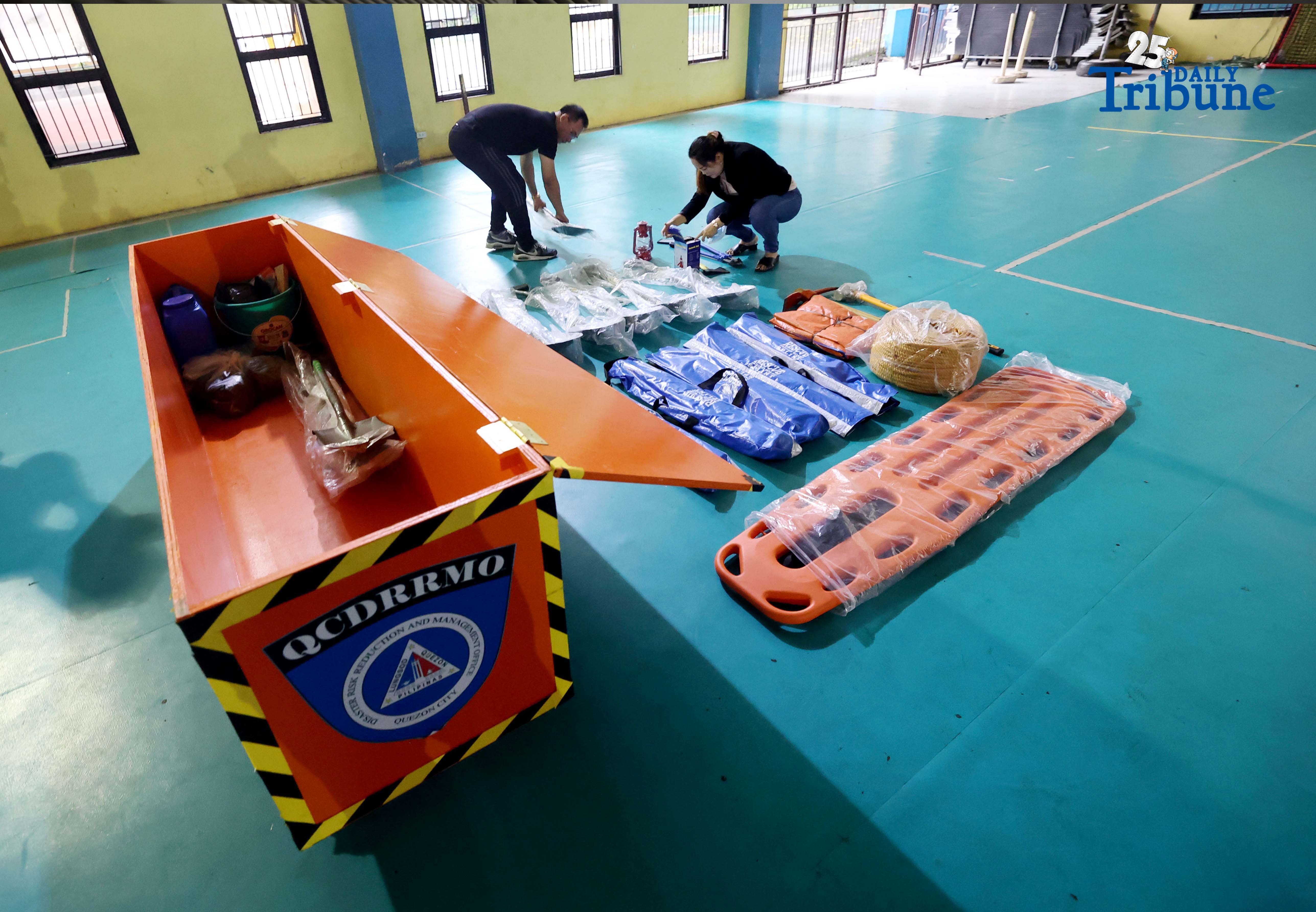 (October 14 2025) Disaster Risk Reduction and Management Council Coordinator Freddie Cayabyab conduct an inspection of “Earthquake Survival Box” issued to the Quezon City High School by the QC-DRRMO including the necessary tools essential for rescue operations during earthquakes or fire on on Tuesday, October 14, 2025. Photo/Analy Labor