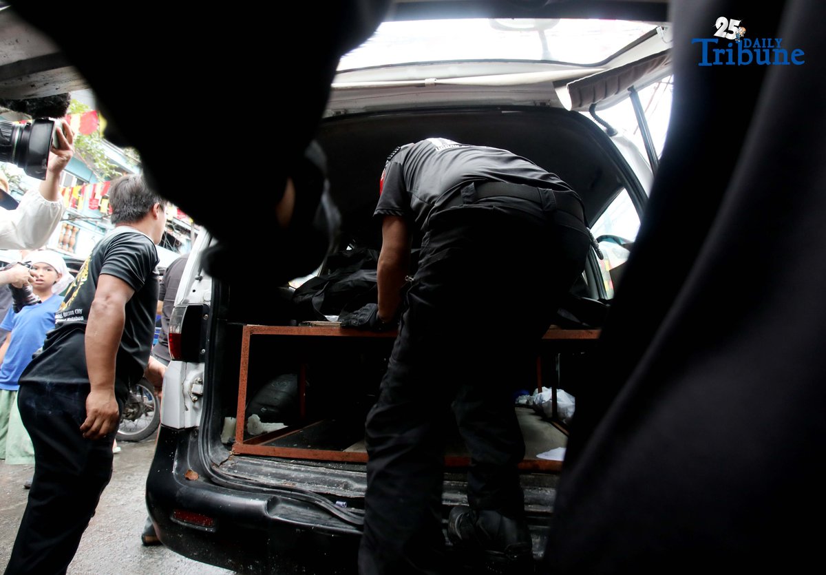 QCDRRMO-USAR personnel carry the body bags of three siblings who died in a third-alarm fire that struck a residential area along P. Florentino Street in Barangay Sto. Domingo, Quezon City, on Tuesday. The victims, aged 10, 7, and 5, were trapped inside their home as firefighters battled the blaze. Authorities are still investigating the cause of the fire.