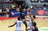 BONG Quinto of Meralco loses the ball against the tight Blackwater defense during their PBA 50th Season Philippine Cup on Wednesday. The Bolts won, 105-96.