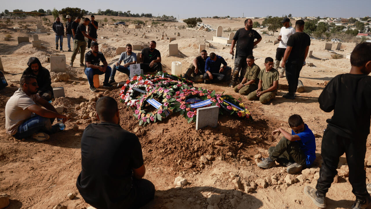 Hamas says committed to truce, returning hostage remains