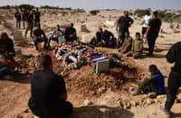 Hamas says committed to truce, returning hostage remains