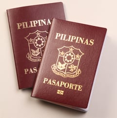 DMW: Withholding OFW passports is a contract violation