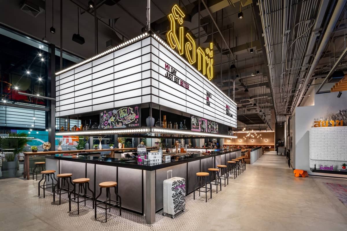 After a long day of travel, checking in at Moxy Bangkok Ratchaprasong is a fun experience as the front office also serves as the hotel’s bar.