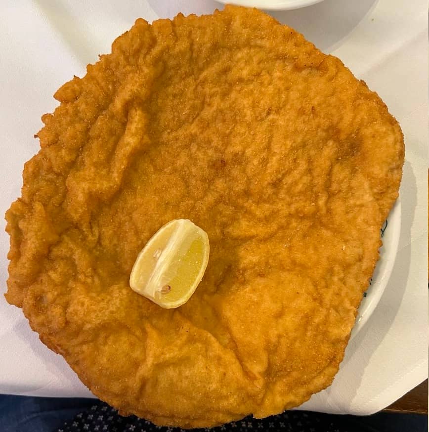 Revered wiener schnitzel Still prepared and served the same way since 1905.