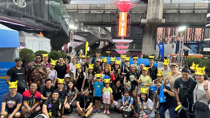 Pokemon Go Trainers from around the world gather for a commemorative photo.