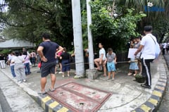 Long Line for five peso half chicken spring
