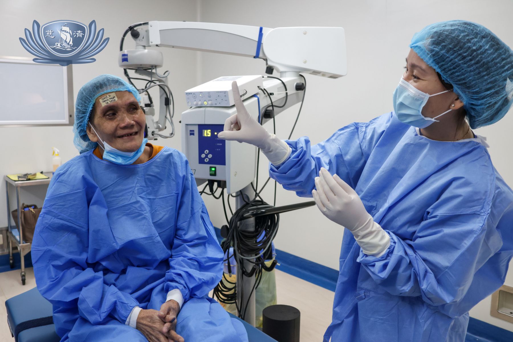 TZU Chi Eye Center volunteer doctor Jessica Daza (right) checks the restored sight of Delia Corot after the successful removal of her cataract.