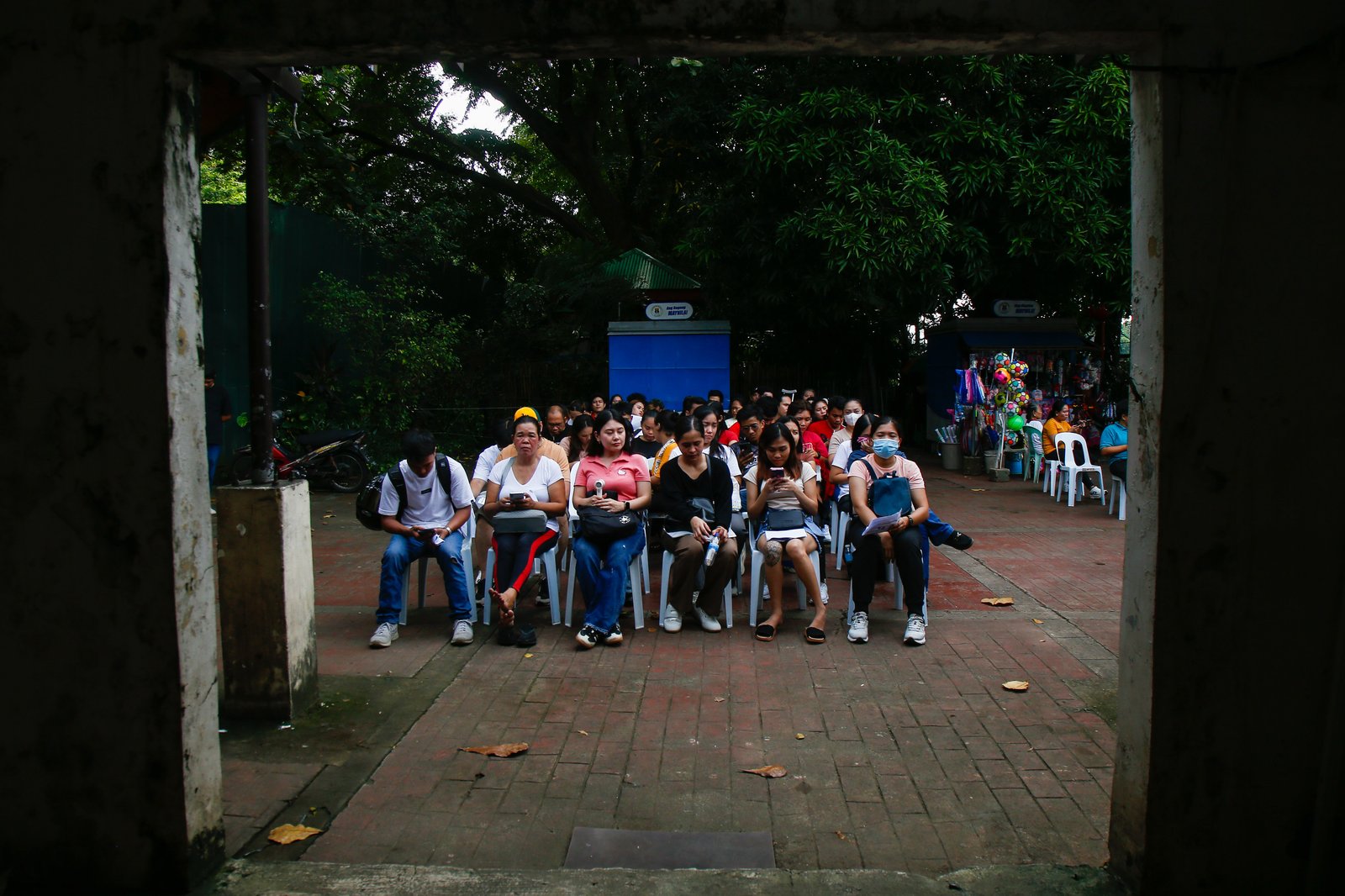 Voters flock to Mabini Hall in Luneta Park, Manila, on 20 October 2025 for the  in preparation for the 2026 barangay and Sangguniang Kabataan elections (BSKE).  Voter registration for the BSKE will be held from Oct. 20 to May 18, 2026.