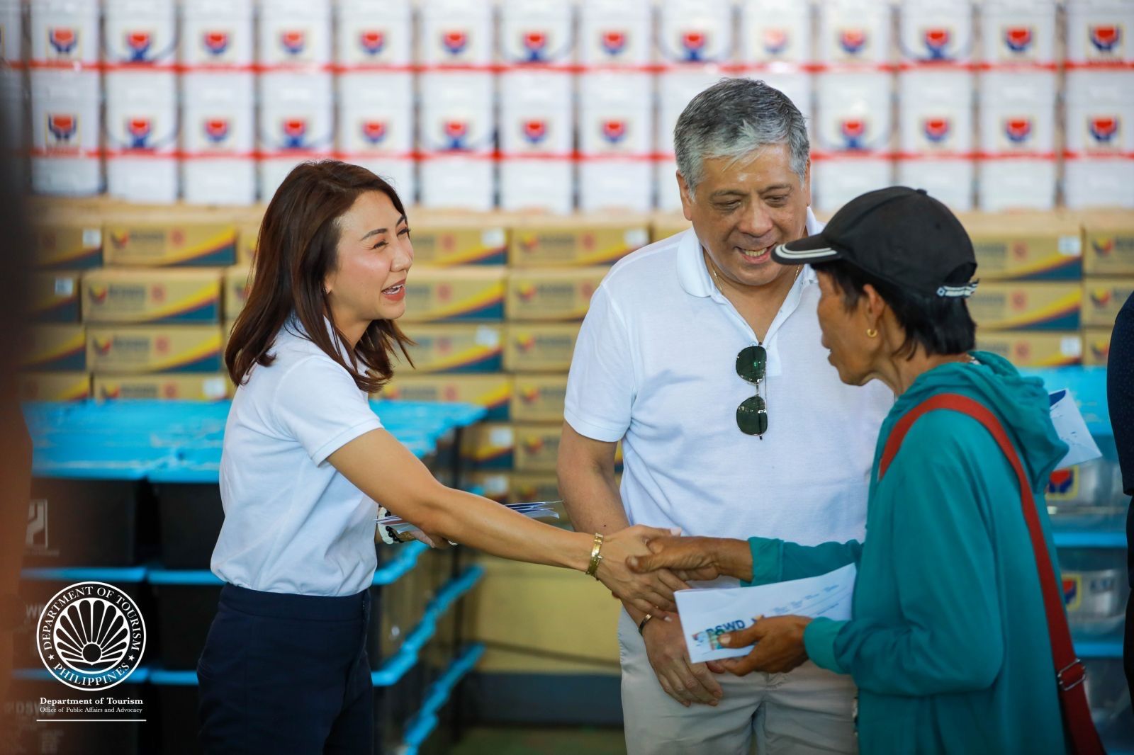 DOT, DSWD distribute aid to Masbate tourism workers hit by Typhoon Opong