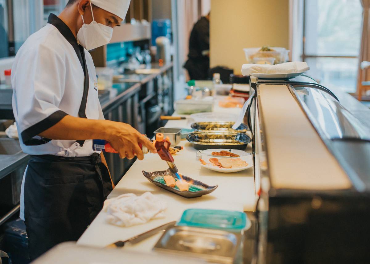A sushi chef in action.