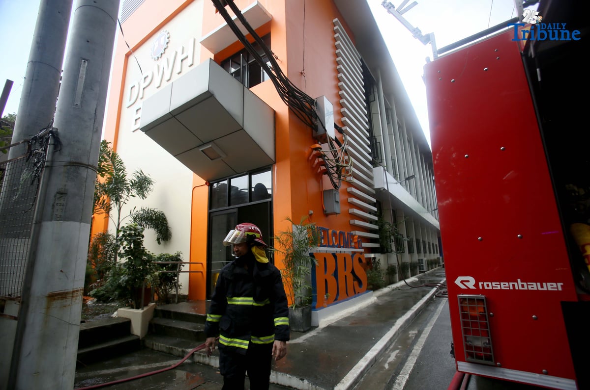 Firefighters rushed to contain a third-alarm fire that broke out at the Department of Public Works and Highways (DPWH) building along EDSA, Barangay Pinyahan, Quezon City, on Wednesday afternoon.