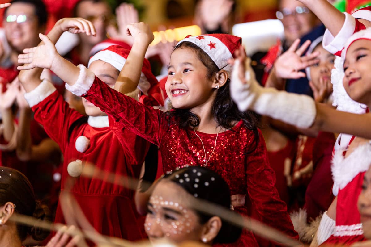 Children enjoy the Christmas tree lighting ceremony at SM City Manila on Friday, 24 October 2025, as the mall unveils its giant Christmas tree adorned with a large ribbon to usher in the holiday season and spread festive cheer.
